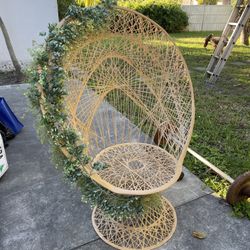 Russell Woodward peacock chair