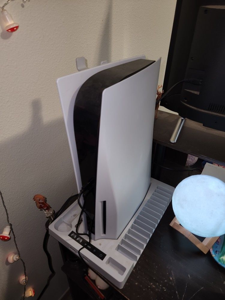 PS5 And Controller.