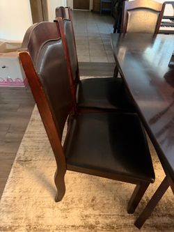 Six chairs with wooden table