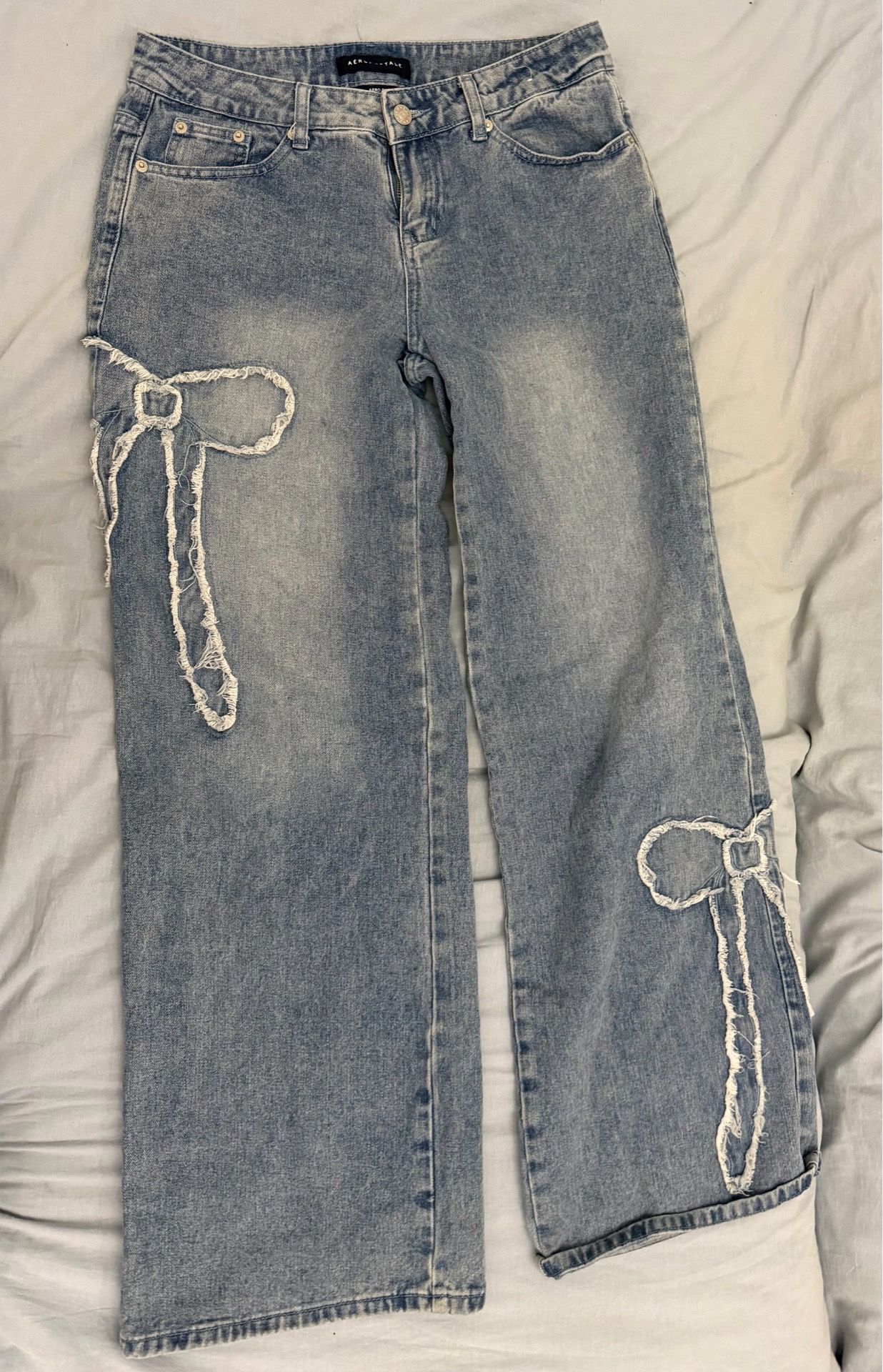 Aeropostale blue wide leg jeans with bow detail