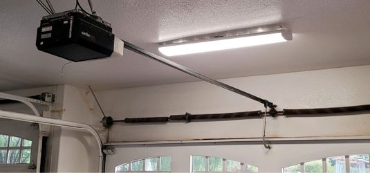 Garage Door Broken Spring Opener Off Track Replace Adjustment And Parts