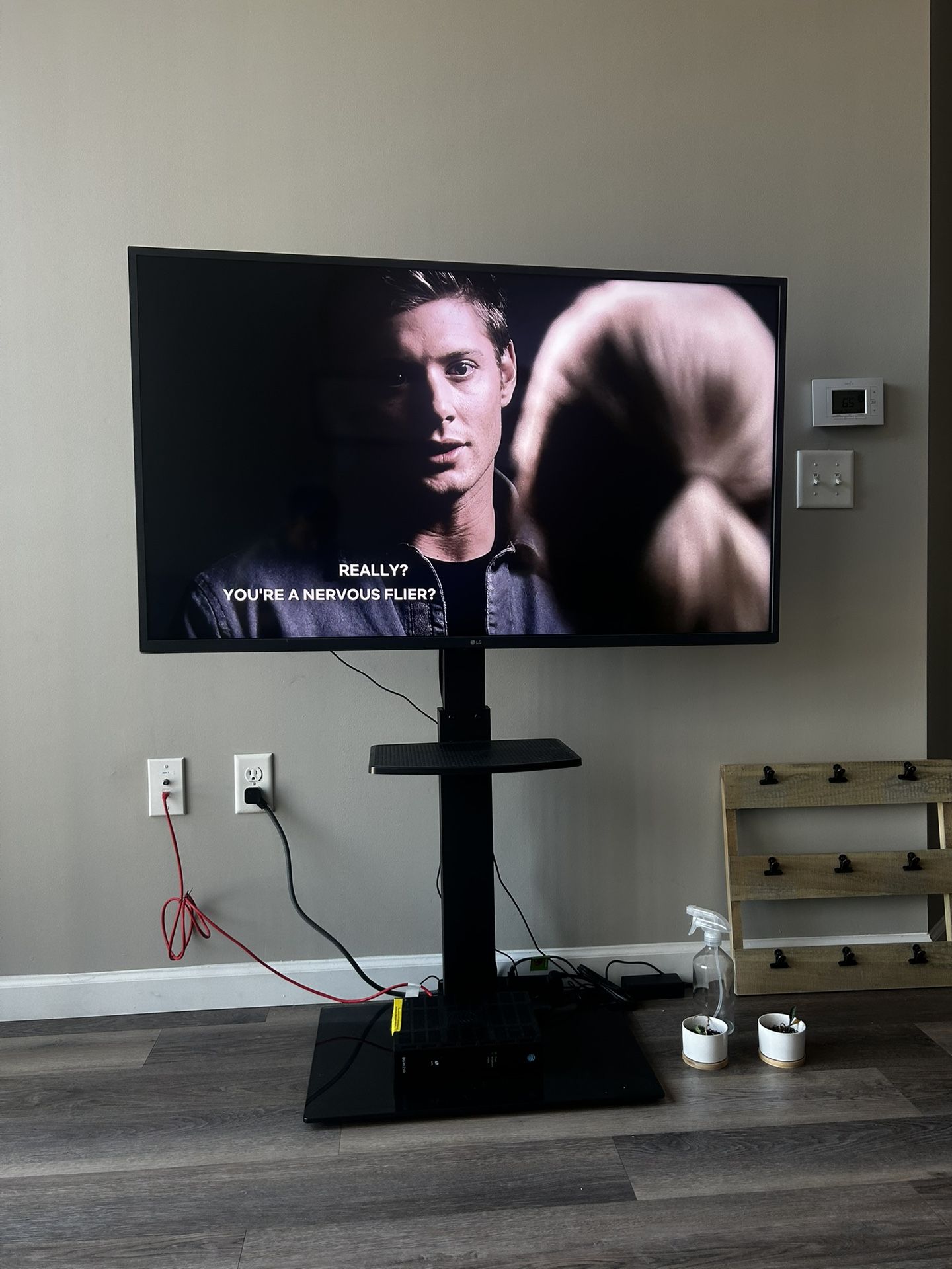 LG 50" 4K UHD Smart TV (Model 50UN7300AUD) + Universal TV Stand