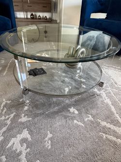 3 Glass tables with lucite legs $200