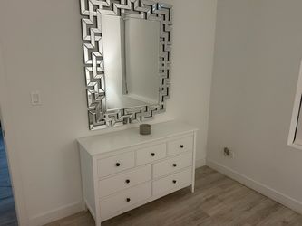 White dresser with small and medium drawers