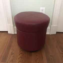 Round leather ottoman