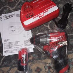 Milwaukee M12 Hammer Drill Charger And 2.0 Battery
