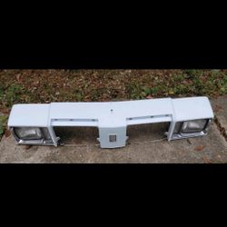 78-79 CUTLASS SUPREME HEADER PANEL WITH LIGHTS AND BEZELS USED OEM GOOD CONDITION 