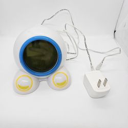 Onaroo Teach Me Time Talking Alarm Clock Green Night Light White Blue Kid Child 

Runs on two AA batteries or optional power cord. 
Great working cond