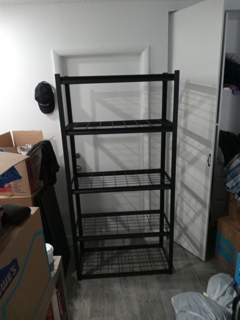 Metal Storage Rack. 5 Adjustable  Shelves. 