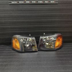 2002 - 2009 GMC Envoy Headlights Black NEW 