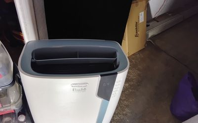 PORTABLE AIR-CONDITIONING  (Like New) barley used