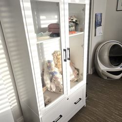 Glass door cabinet with locking file drawer
