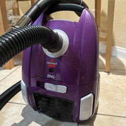 Vacuum Cleaner with Retractable Cord