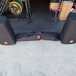 JBL EON 615 powered speakers with bag , covers and stands