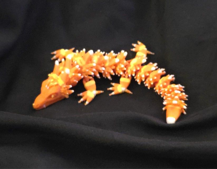 Candy corn dragon for Halloween.