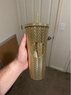 Gold chrome Starbucks cup