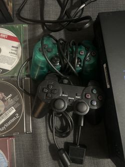 PlayStation 2 Console + 15 Games + 2 controllers 
