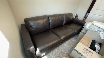 Brown faux leather couch sofa
