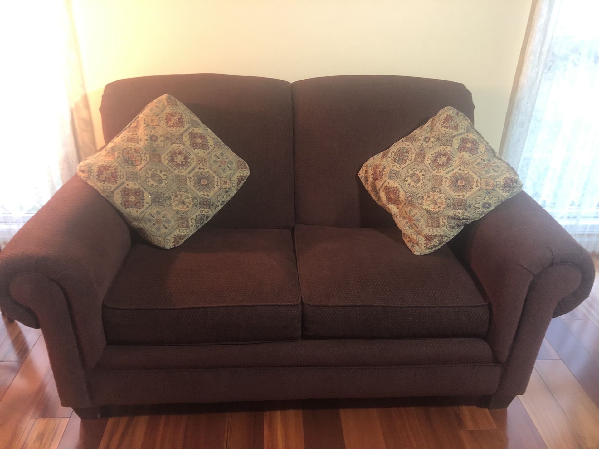 Burgundy and tan 3 piece living room set
