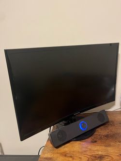 Samsung Curved Monitor 24inc with a speaker