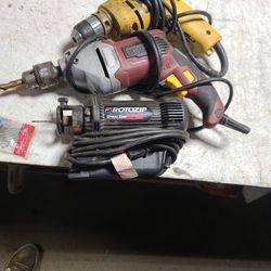 2 Drills And Roto Zip Saw