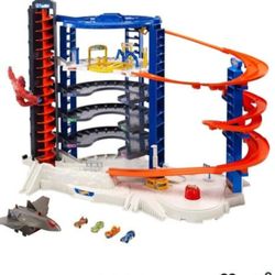 Hot Wheels Toy Car Track Set & 4 1:64 Scale Cars, Super Ultimate Garage, 3+ ft Tall with Motorized Gorilla & Storage for 140 Cars 

NO BOX