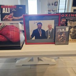 Muhammad Ali autographed boxing gloves