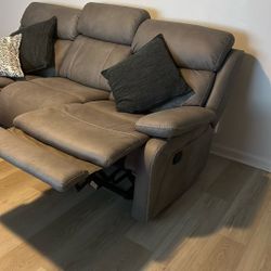Sofa recliner middle cupholder opens with charger station and light