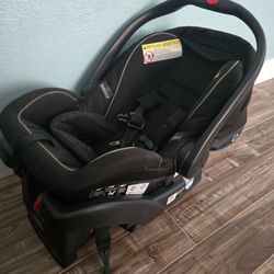 SnugRide Infant Car Seat And Holder