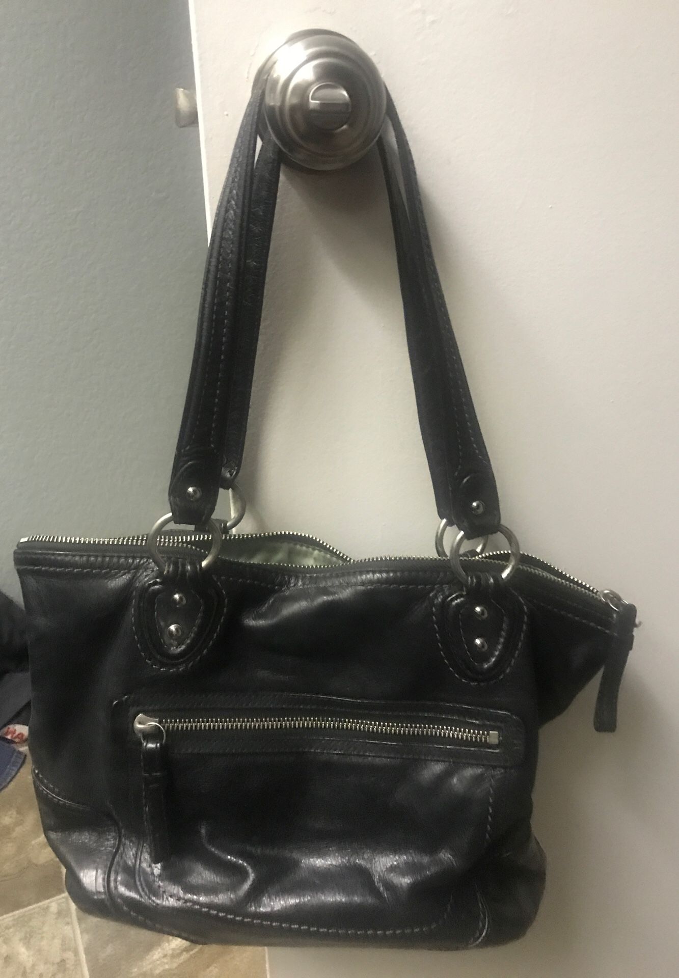 Black leather coach handbag