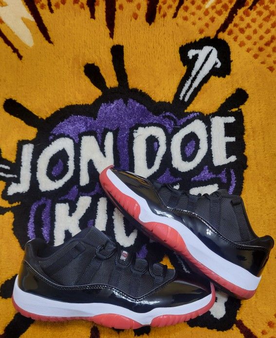 Jordan 11 Low Bred