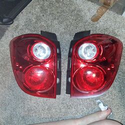 Driver and passenger sides of 2010-2015 Chevrolet Equinox models.