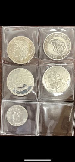 Four Troy Ounces Of Silver And A 90% Half