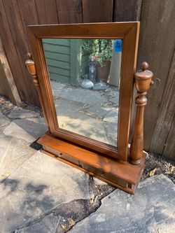 Tilting vanity mirror with drawers