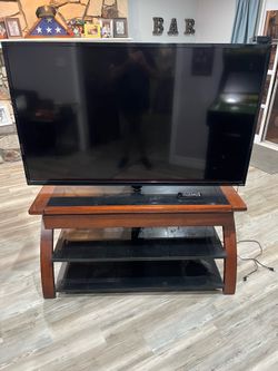 55” Vizio TV on swiveling stand