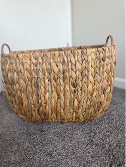 2 large woven storage baskets
