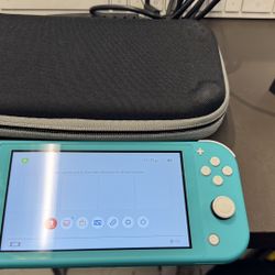 Nintendo Switch Lite w case and charger no trades pick up in Tacoma FIRM PRICE 