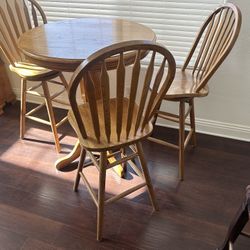 Solid Oak Pub Table w / Three Backed-Swivel Stools