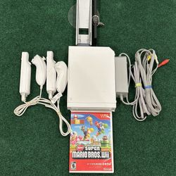 Nintendo Wii White Console + Super Mario Wii Game + 2 Remotes + 2 Nunchuck 