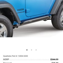 Quadratec qrc rocker guards for 2 door jk wrangler in textured black.