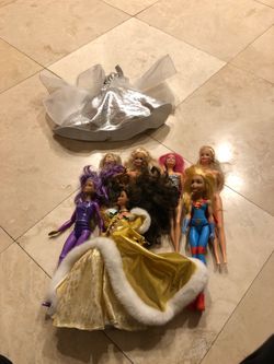 7 Barbies Dolls