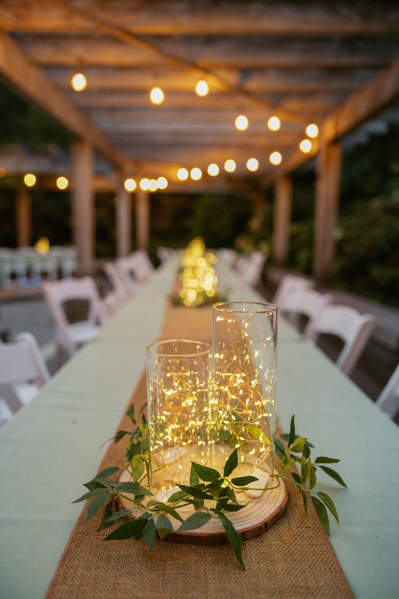 Wedding centerpieces - Fairy Lights, Glass, And Wood