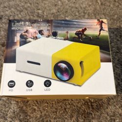 Mini Projector,1080P HD Portable Mini Private Home Theater Projector,Outdoor&Indoor LED Movie Projector,Suitable for Party Traveling Camping