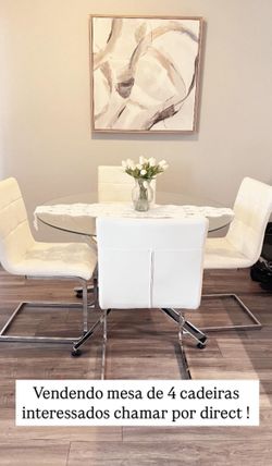 Selling glass table with 4 chairs $200