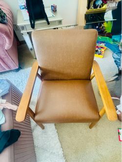 Brand new leather chair, brown color