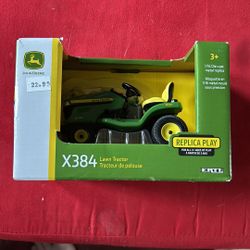 John Deere X384 Lawn Tractor. By Ertl. 1/16 Die Cast Replica Tractor. New