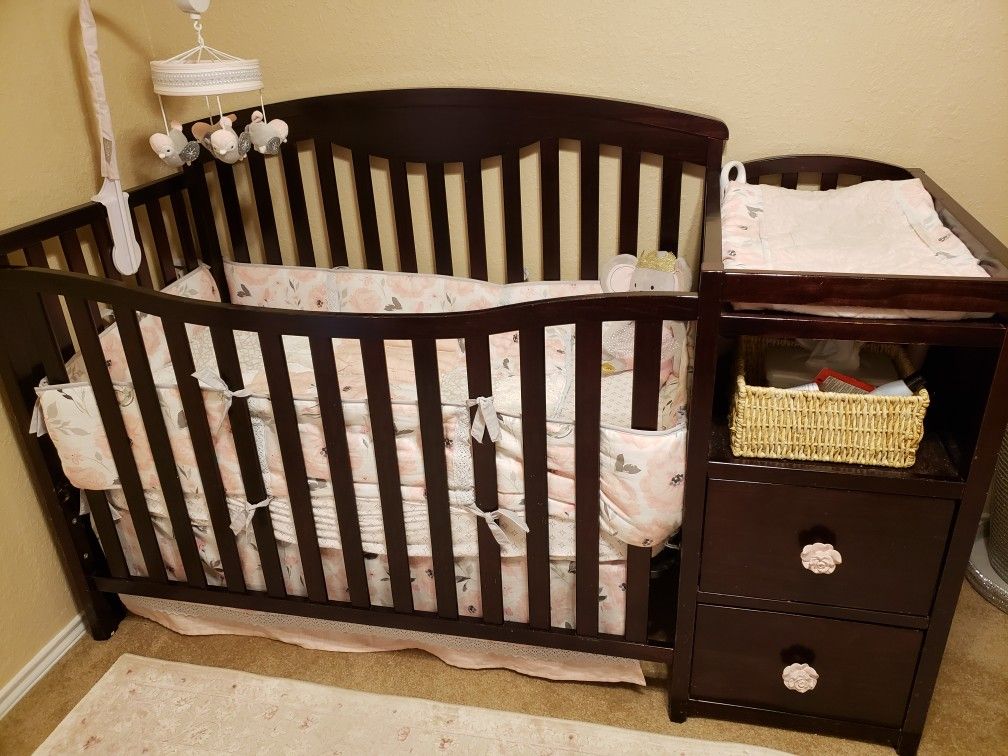 Crib with changing table