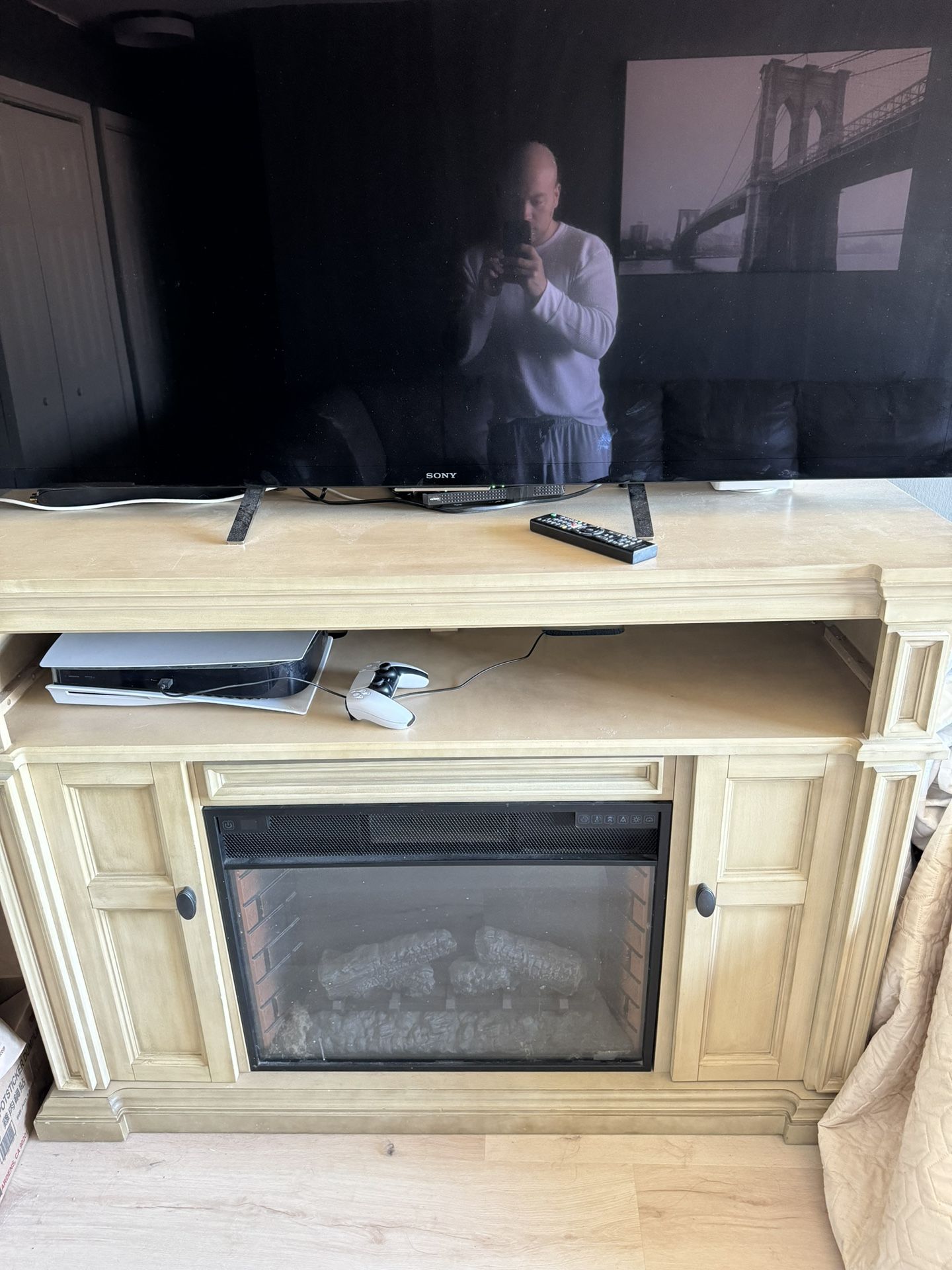 65 INCH SONY TV With TV STAND/ FIRE PLACE