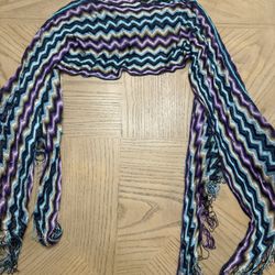 Missoni poncho crop top with a distinctive zigzag pattern in various colors featuring a round neck and fringed edges