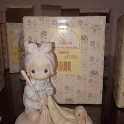 Sweep all your worries away Precious Moments figurine